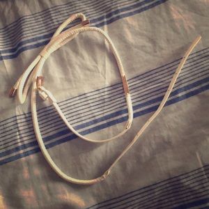 White leather with gold detail